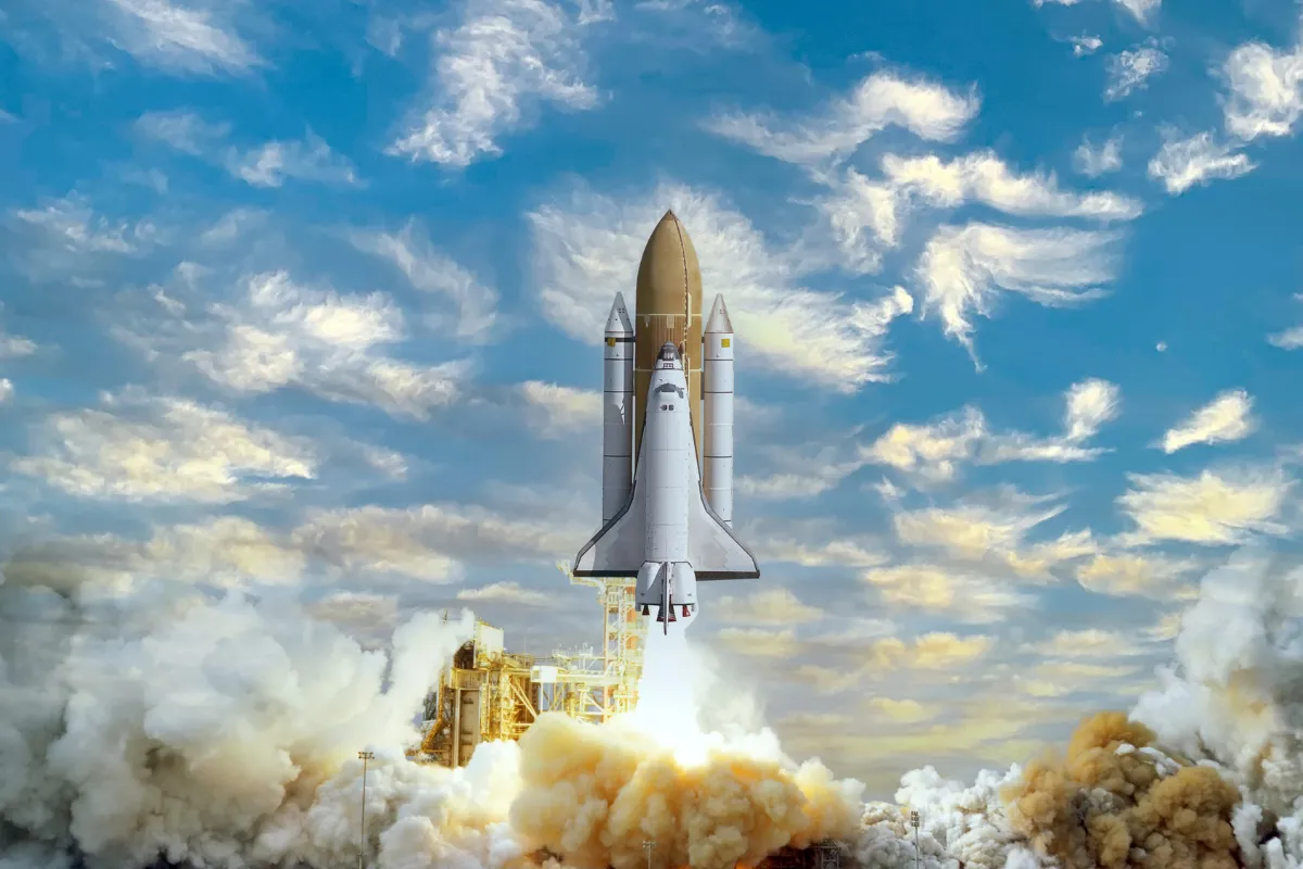 Space shuttle lifting off